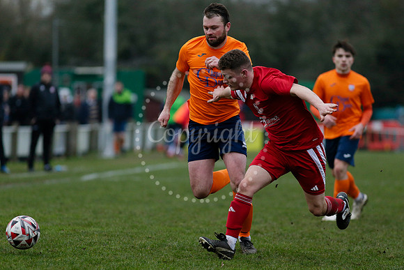 Football action from Diss Town FC vs Parson Drove
