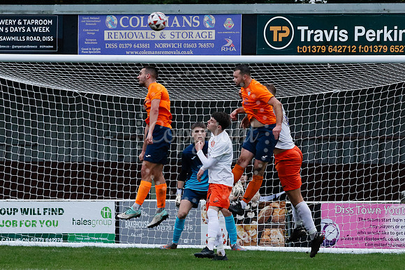 Football action from Diss Town hosting Holland FC.