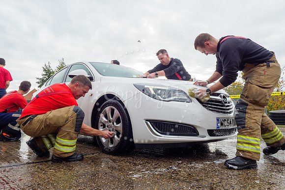 Staff from across Norfolk Fire & Rescue Service take part in a f