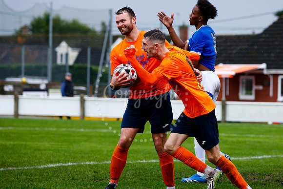 Football action from Diss Town vs FC Peterborough