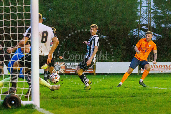 Football action from Diss Town Swaffham Town
