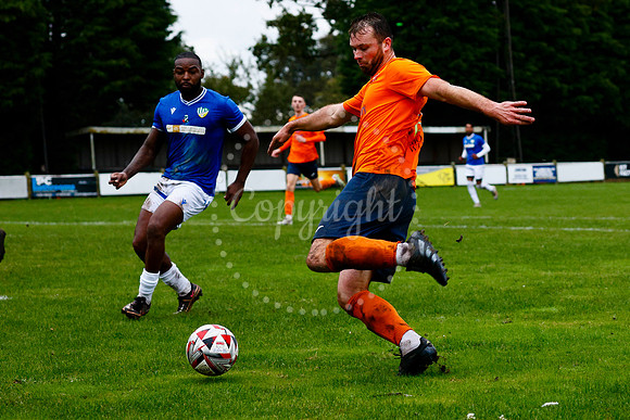Football action from Diss Town vs FC Peterborough