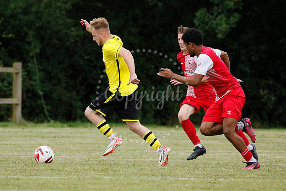 Football action from Scole United vs Norwich CEYMS