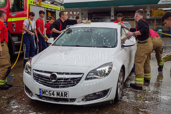 Staff from across Norfolk Fire & Rescue Service take part in a f