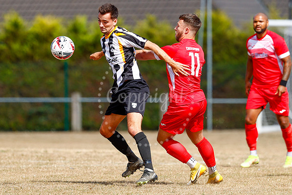 Football action from Harleston v Woodbridge
