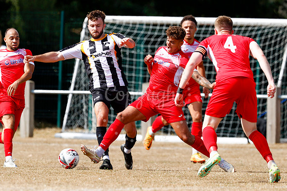 Football action from Harleston v Woodbridge