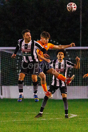 Football action from Diss Town Swaffham Town