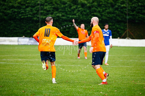 Football action from Diss Town vs FC Peterborough