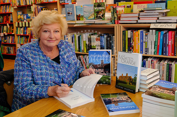 Baronness Elaine Murphy signing her book in Diss Publishing.