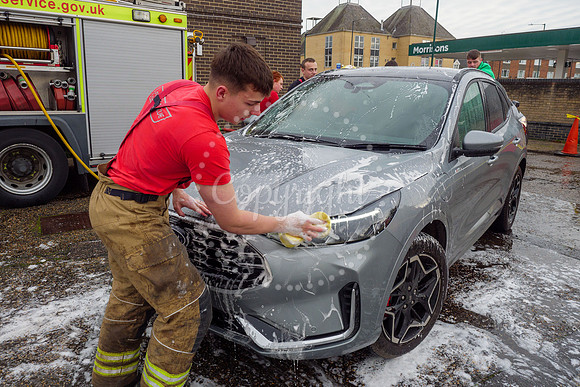 Staff from across Norfolk Fire & Rescue Service take part in a f