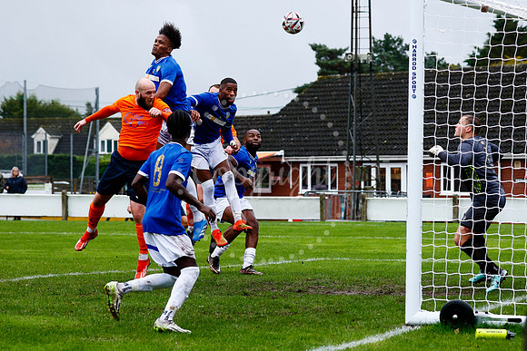 Football action from Diss Town vs FC Peterborough
