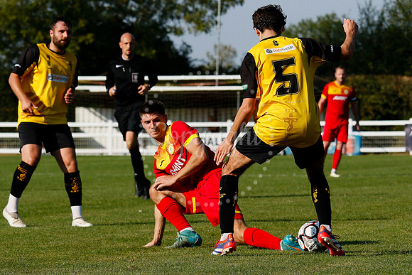 Football action from Walsham-le-Willows vs Fakenham Town