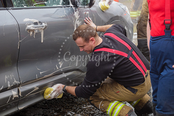 Staff from across Norfolk Fire & Rescue Service take part in a f