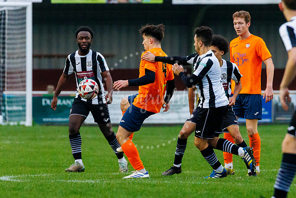 Football action from Diss Town Swaffham Town