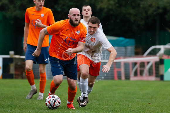 Football action from Diss Town hosting Holland FC.