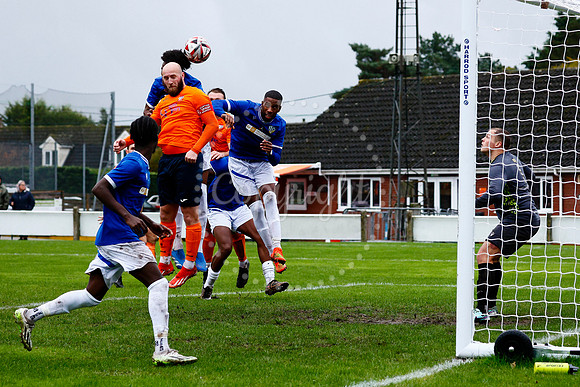 Football action from Diss Town vs FC Peterborough
