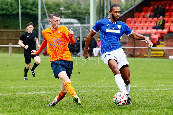 Football action from Diss Town vs FC Peterborough