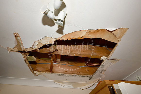Carl Forster with his water damaged house