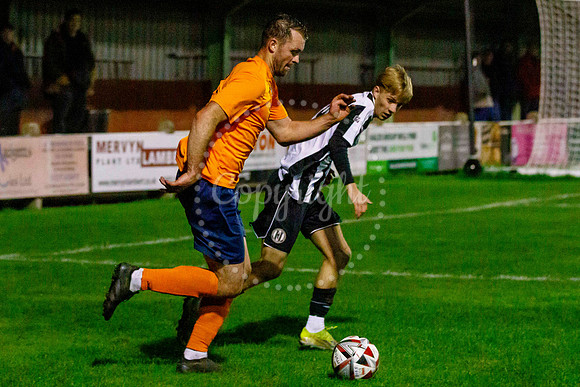 Football action from Diss Town Swaffham Town