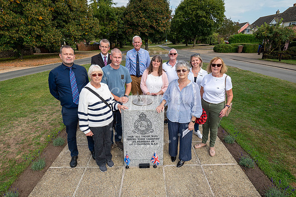 Tuddenham war memorial on the village green.Rededication of the