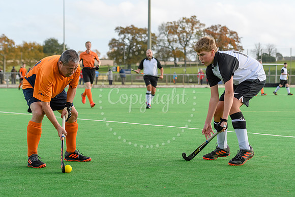 Hockey action from Harleston Magpies Men's 4 v Bury St Edmunds 3