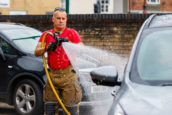 Staff from across Norfolk Fire & Rescue Service take part in a f