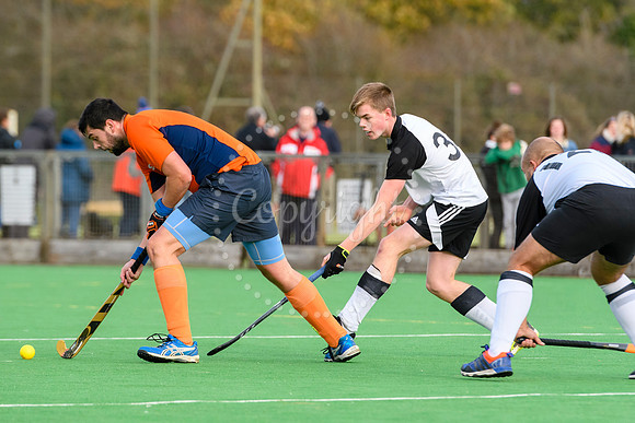 Hockey action from Harleston Magpies Men's 4 v Bury St Edmunds 3