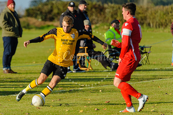 Football action from Scole United v Sheringham