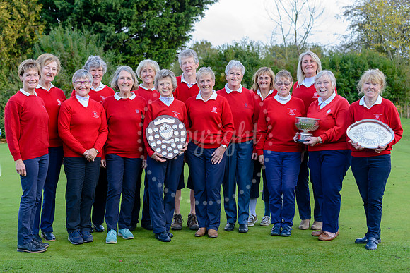 Diss Ladies Golfers celebrate the success for the year with their trophies.