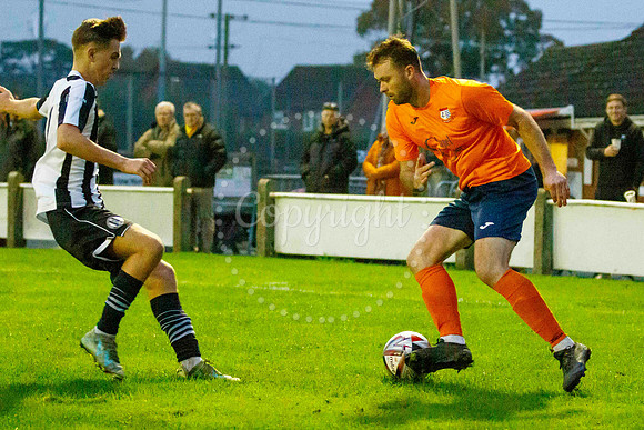 Football action from Diss Town Swaffham Town